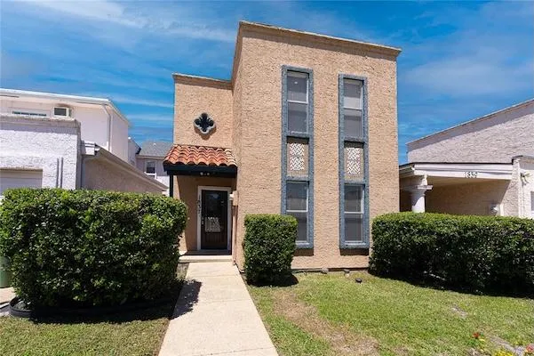 Just Listed: Charming 2-Bedroom Mediterranean-Style Townhouse at 1837 Amber Lane, Carrollton, TX