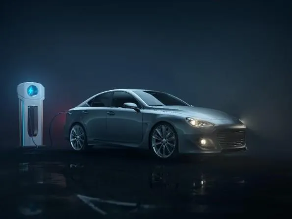 Showroom floor with a mix of electric and gas-powered cars, representing the shifting dynamics of the new car market in 2025.