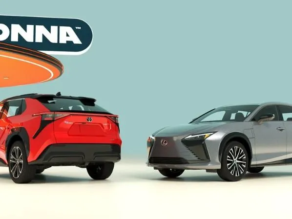 IONNA-branded EV charging stations lined up along a highway rest stop, representing the company’s national expansion.