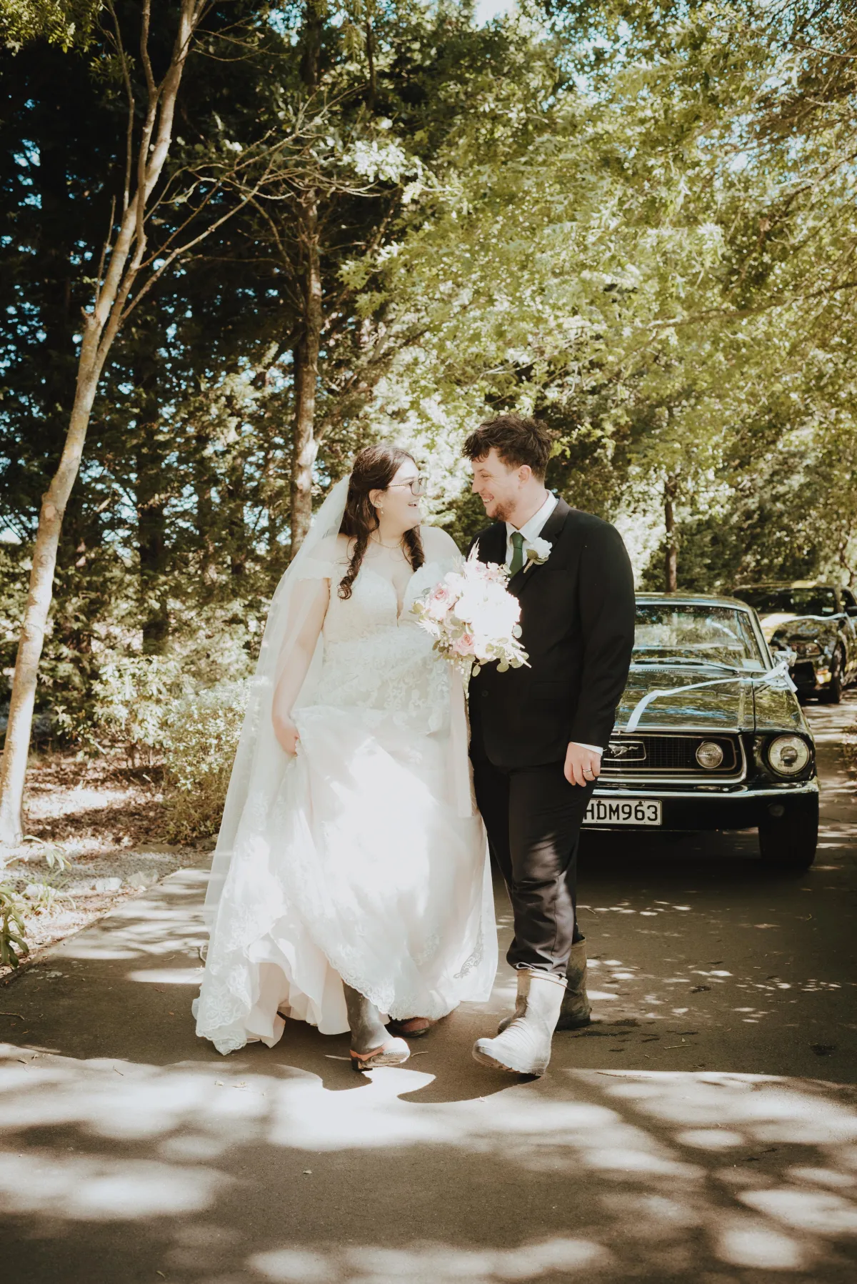 Newlyweds celebrating in their gumboots