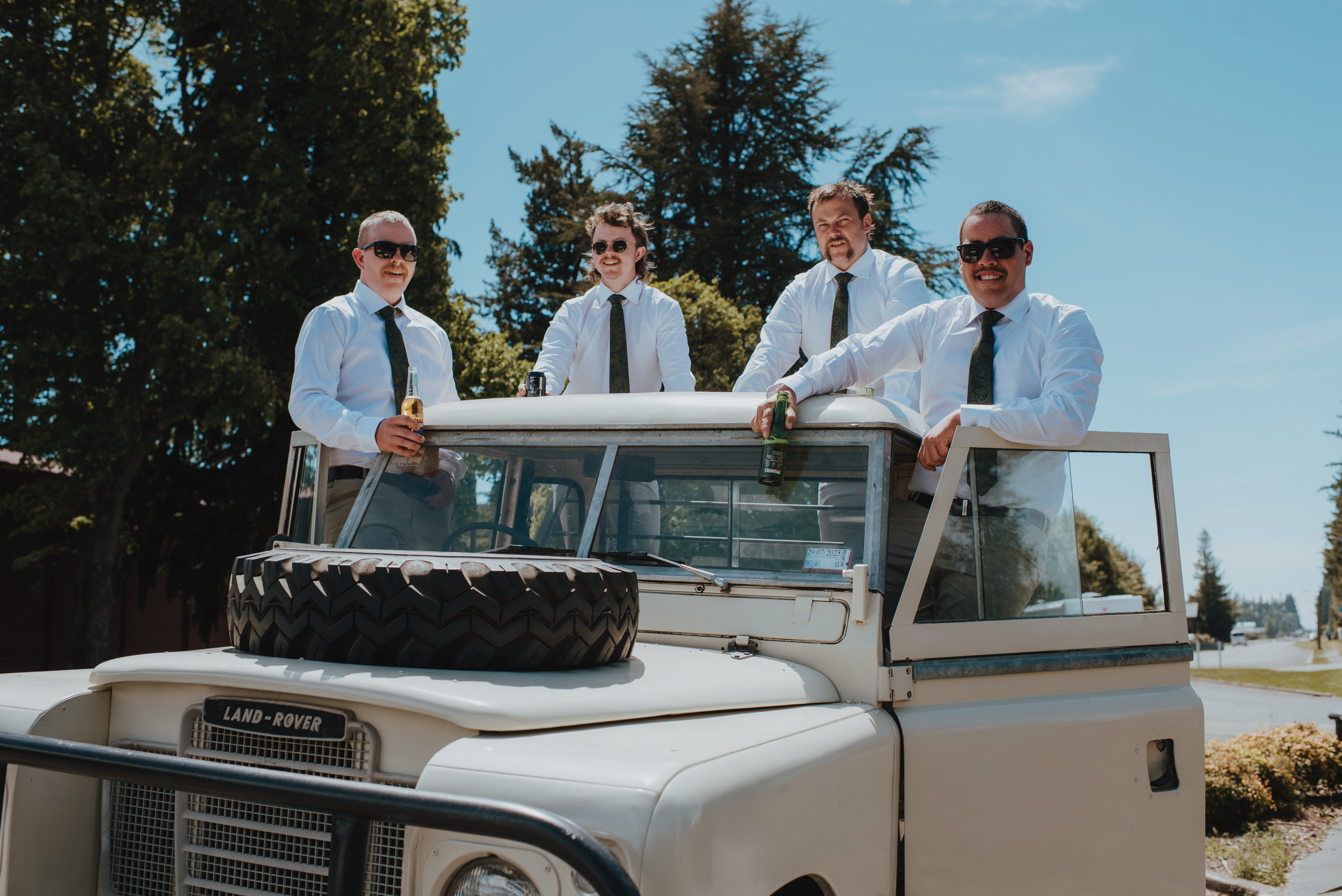 groomsmen portrait on family truck