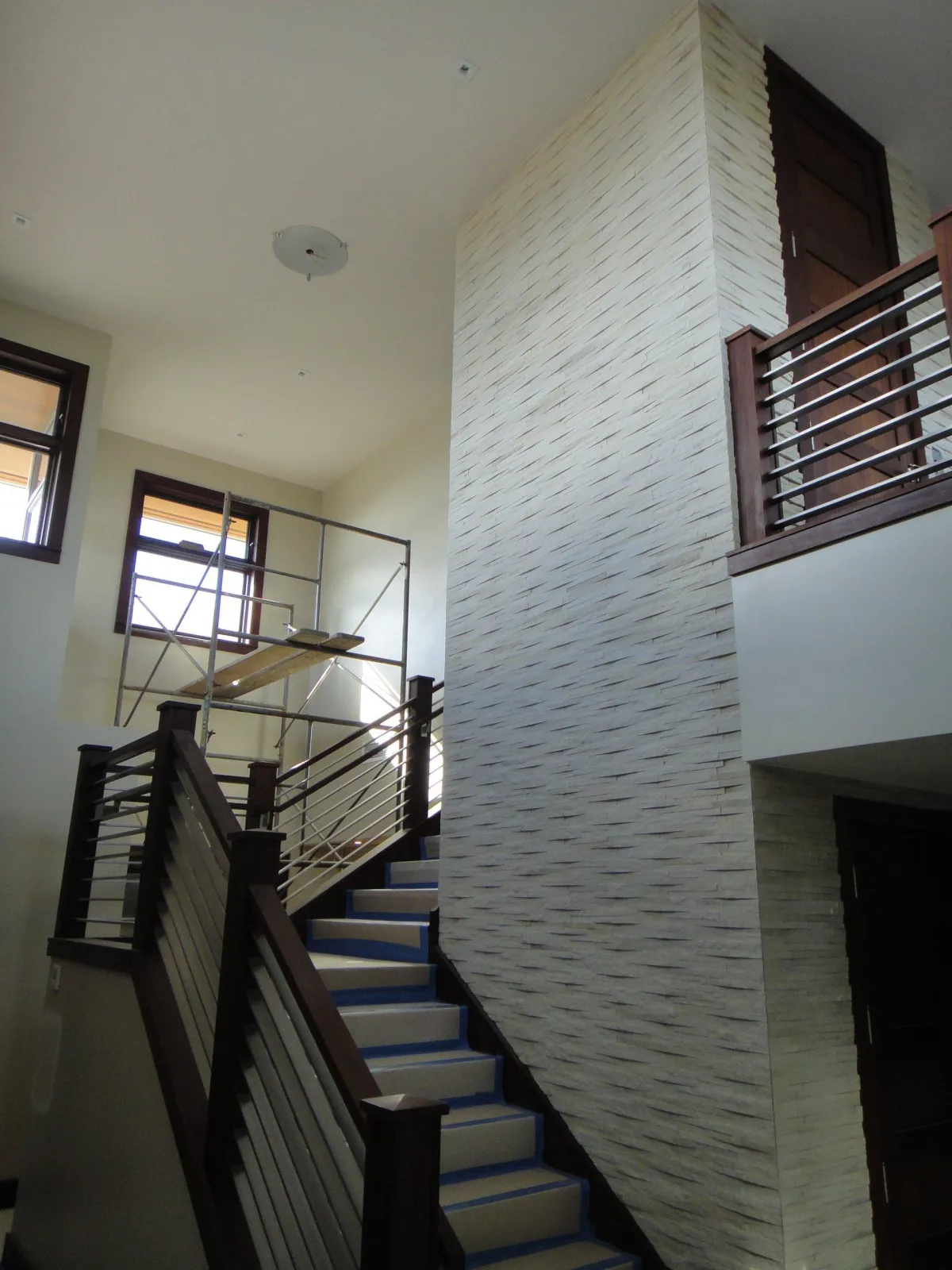 How Much Should You Budget for Ceiling Repair Services?