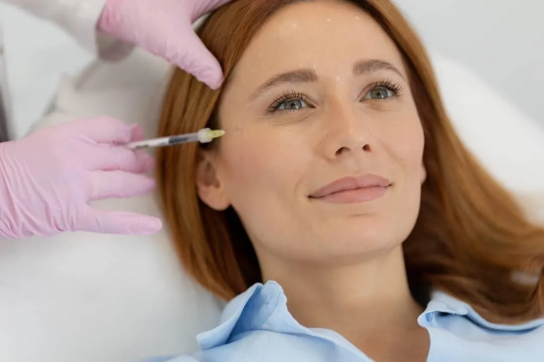 Expert injector performing precise dermal filler treatment, highlighting key factors in choosing qualified providers.