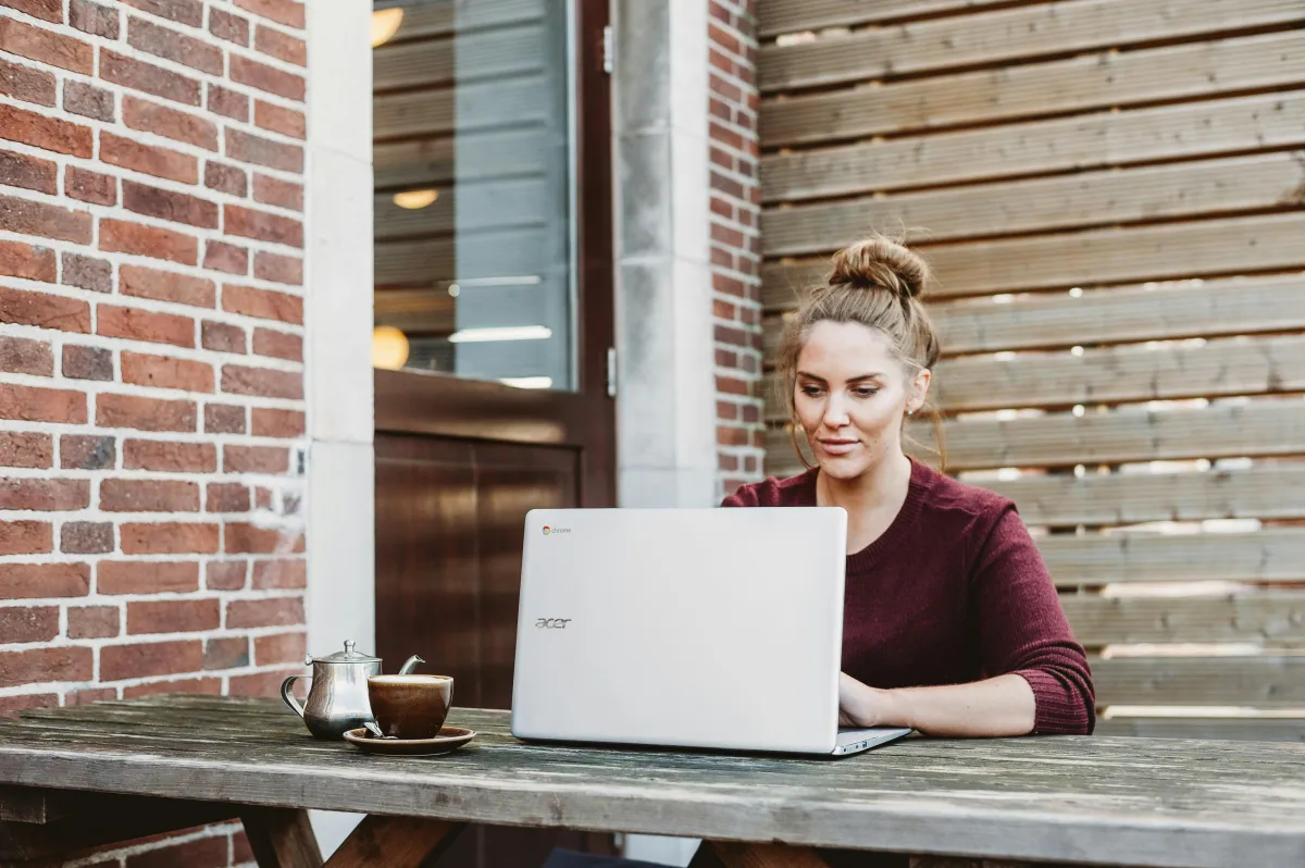 Woman in backyard learning
