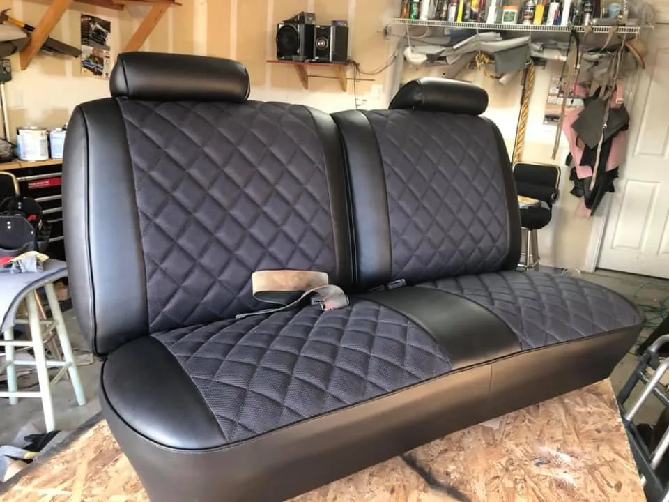 Black leather back seat - work in progress in upholstery shop