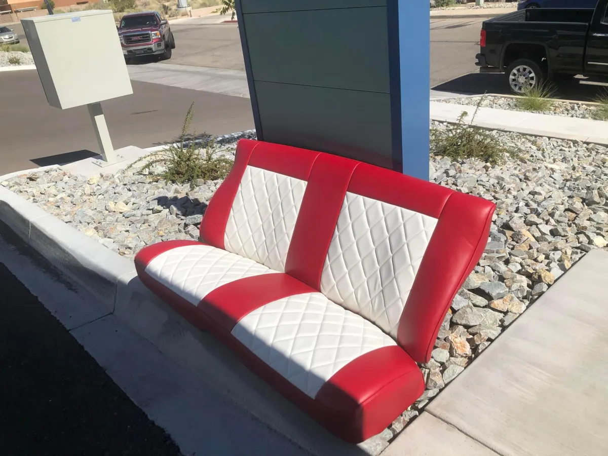 Red and white upholstery for car displayed outside