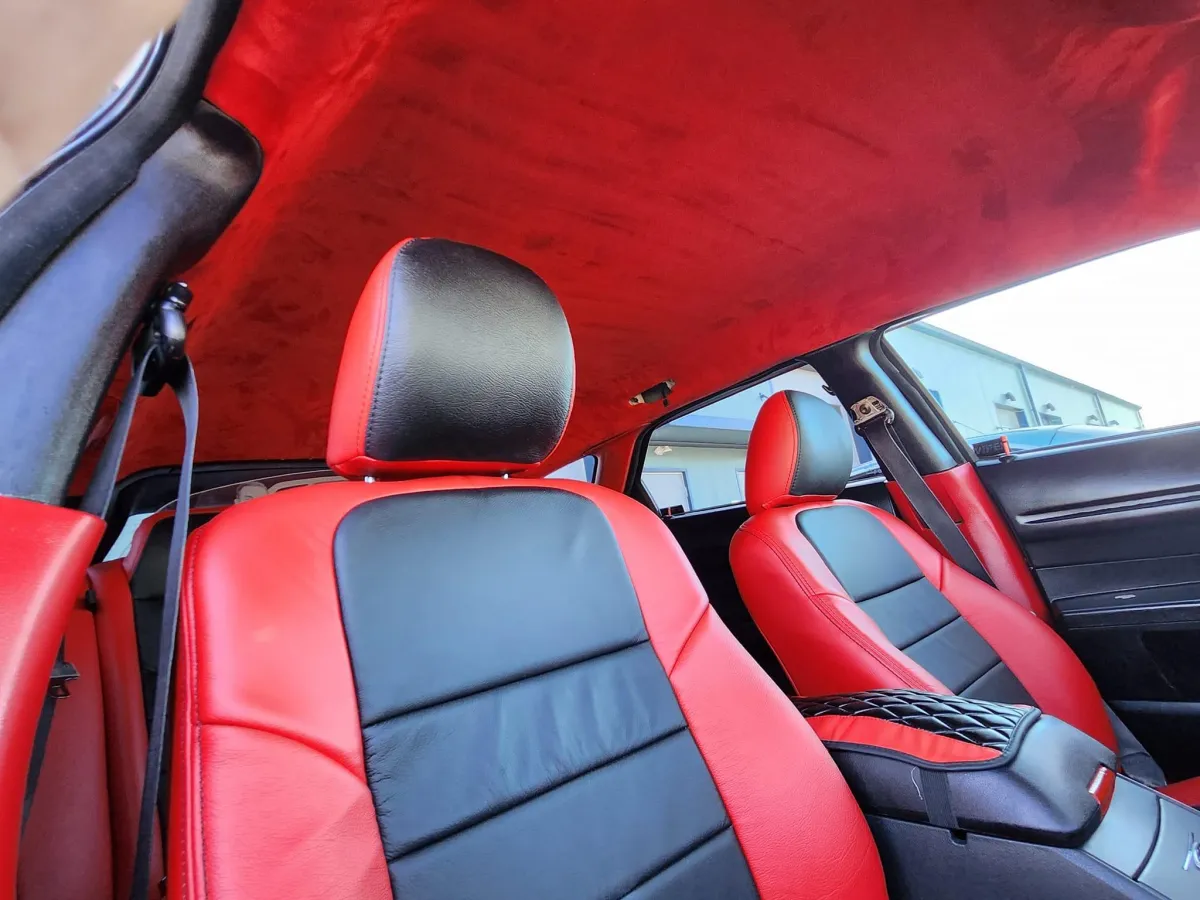 Red leather and sporty upholstery sedan