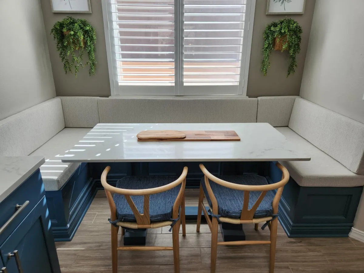 Blue and gray dining area with clean and modern upholstery design