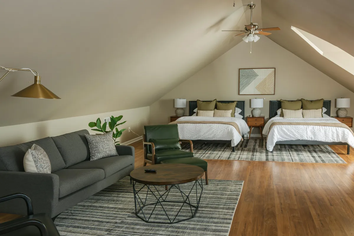 Top floor suite with 2 queen beds, sitting area, Smart TV, and beautiful country views