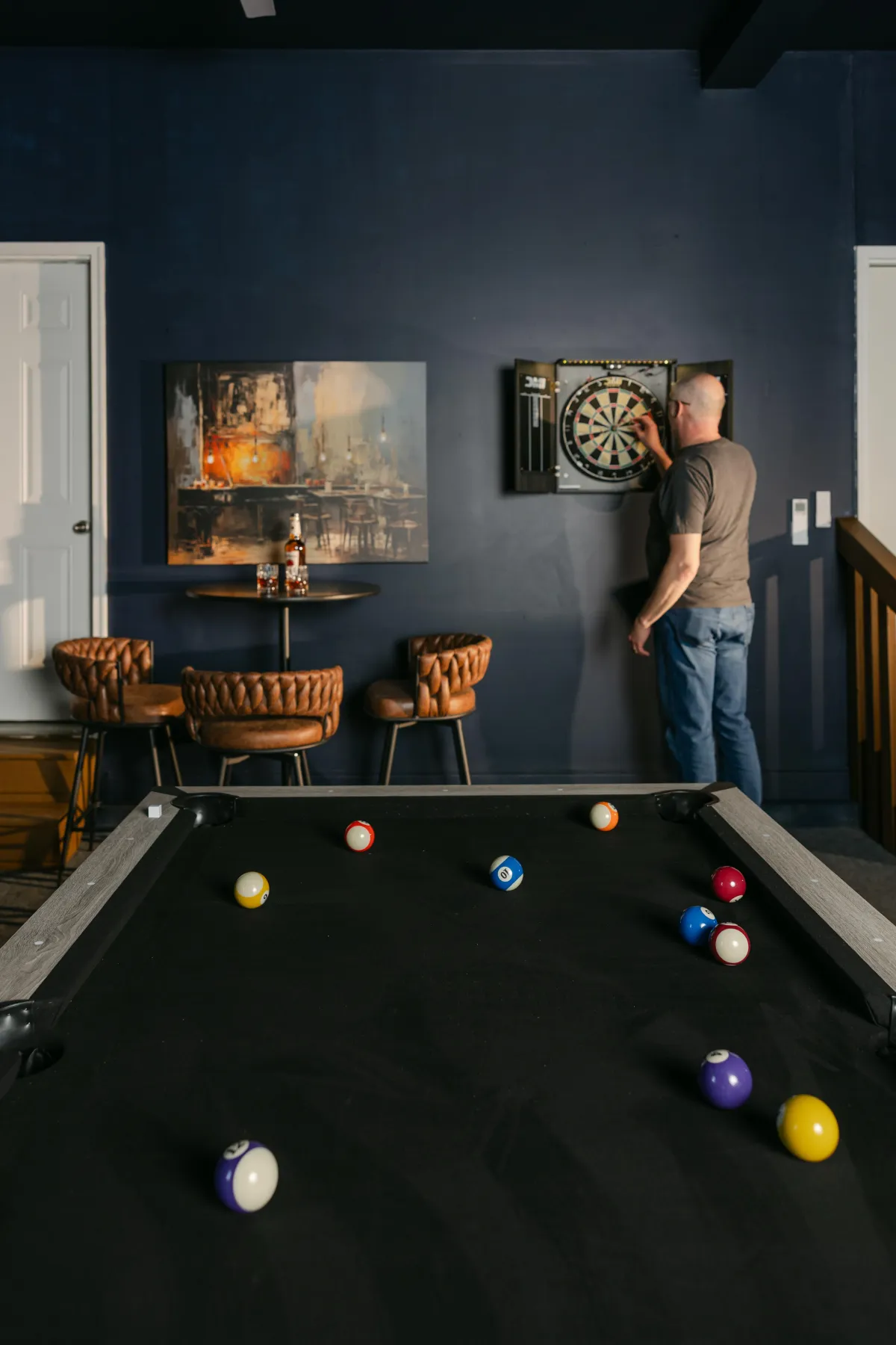 Time flies with a pool table, dart board and your favorite beverage in the dedicated game room