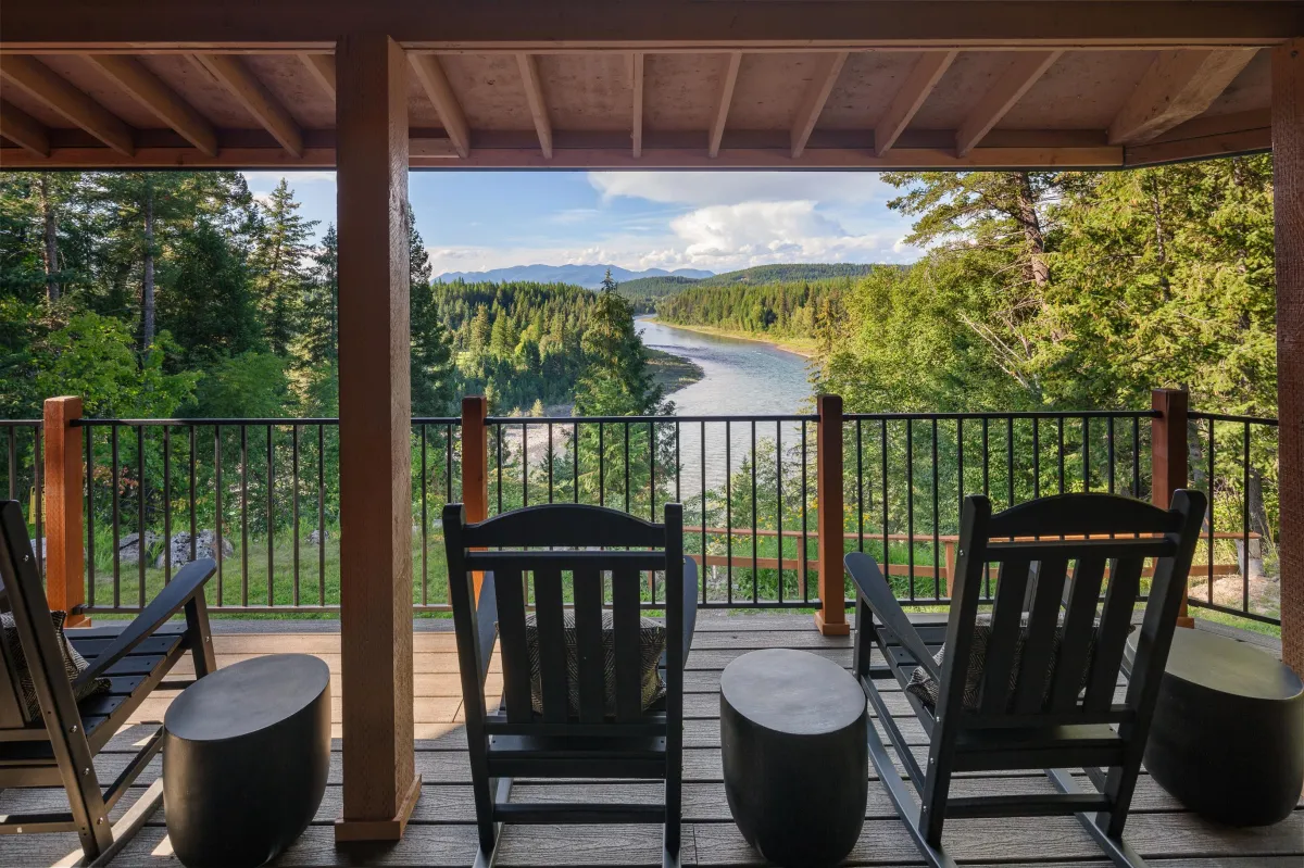 Relax in rocking chairs on the covered patio overlooking the Flathead River and Rocky Mountains. Perfect for morning coffee or evening drinks while soaking in the Montana scenery.