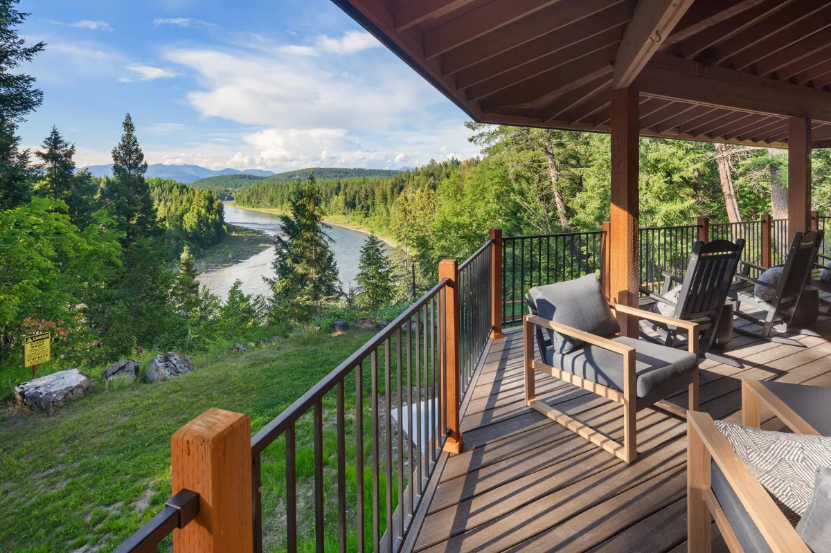 Unwind on the wraparound porch overlooking the Flathead River and mountains beyond. The perfect spot to gather, read, or simply take in the beauty of Montana’s Big Sky Country (no river access).