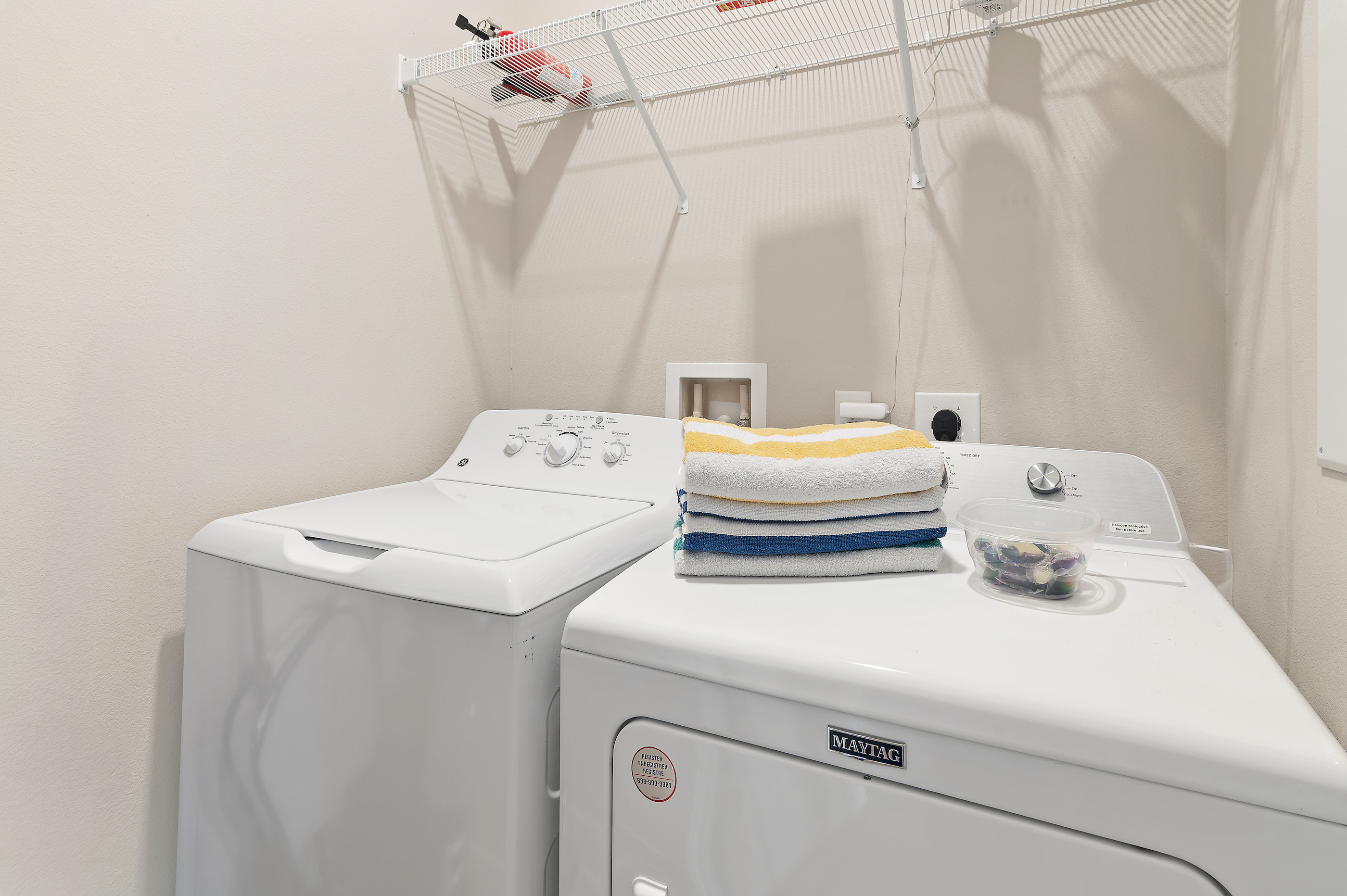 Fully stocked laundry  rooom.
