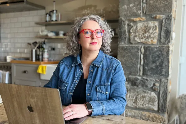Business owner working on book outline from book coach