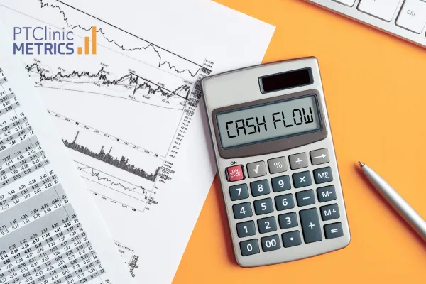 Calculator on yellow background with text saying cash flow and spreadsheets