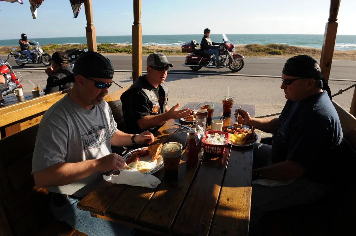 2008 Daytona, Stopping for food, bikers in background helmet,