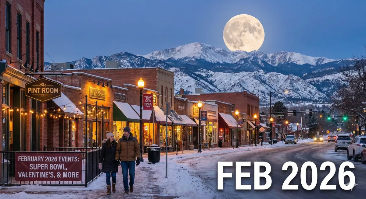 Snowy winter twilight view of Downtown Littleton, Colorado, featuring warm streetlights, active pedestrians on Main Street, and the Rocky Mountains under a bright Snow Moon, illustrating the February 2026 lifestyle guide.