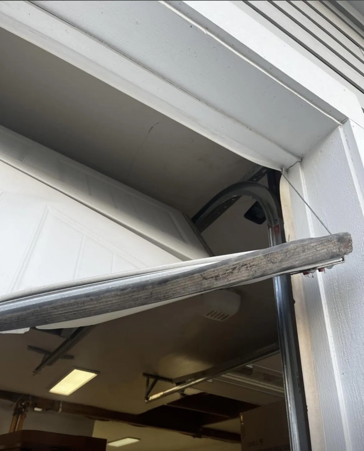 🚨 Garage Door Off Track? Emergency Safety Guide + Professional Repair