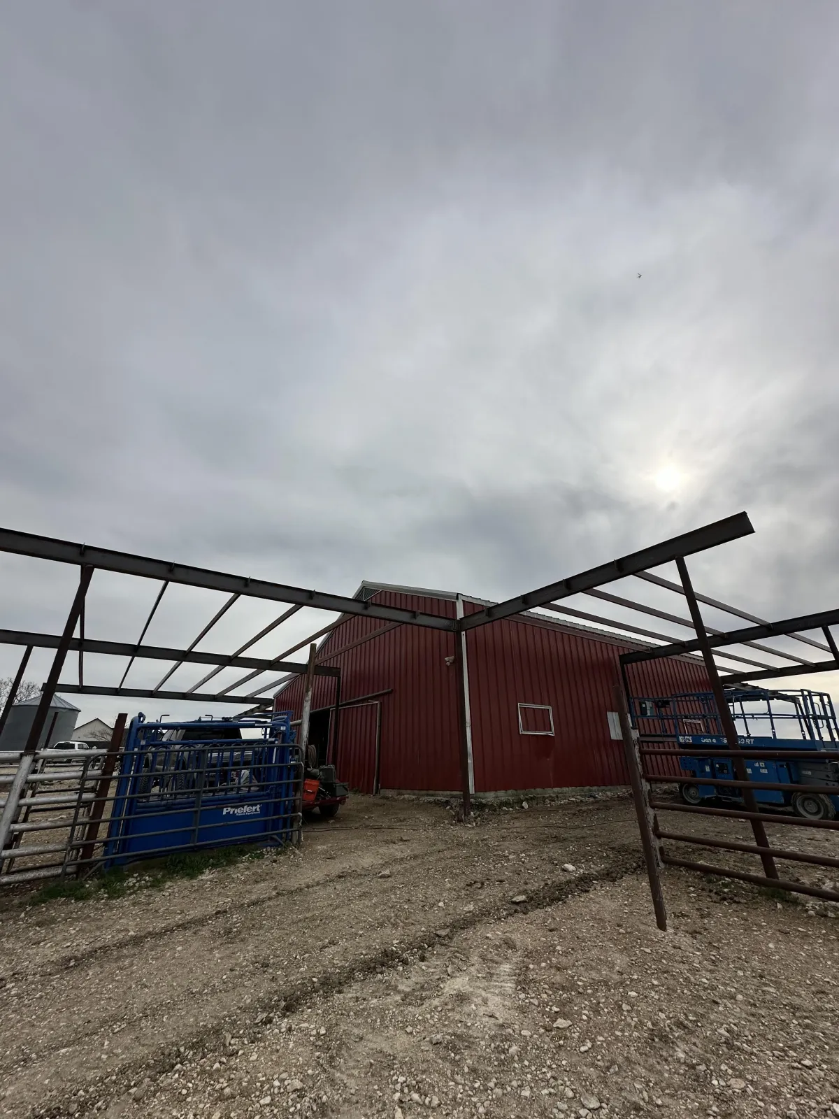 Steel frame for barn/cover — structural members in progress.