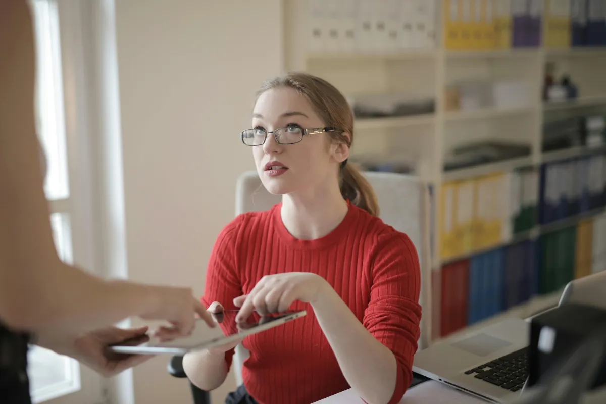 Woman bookkeeper reviewing mistakes