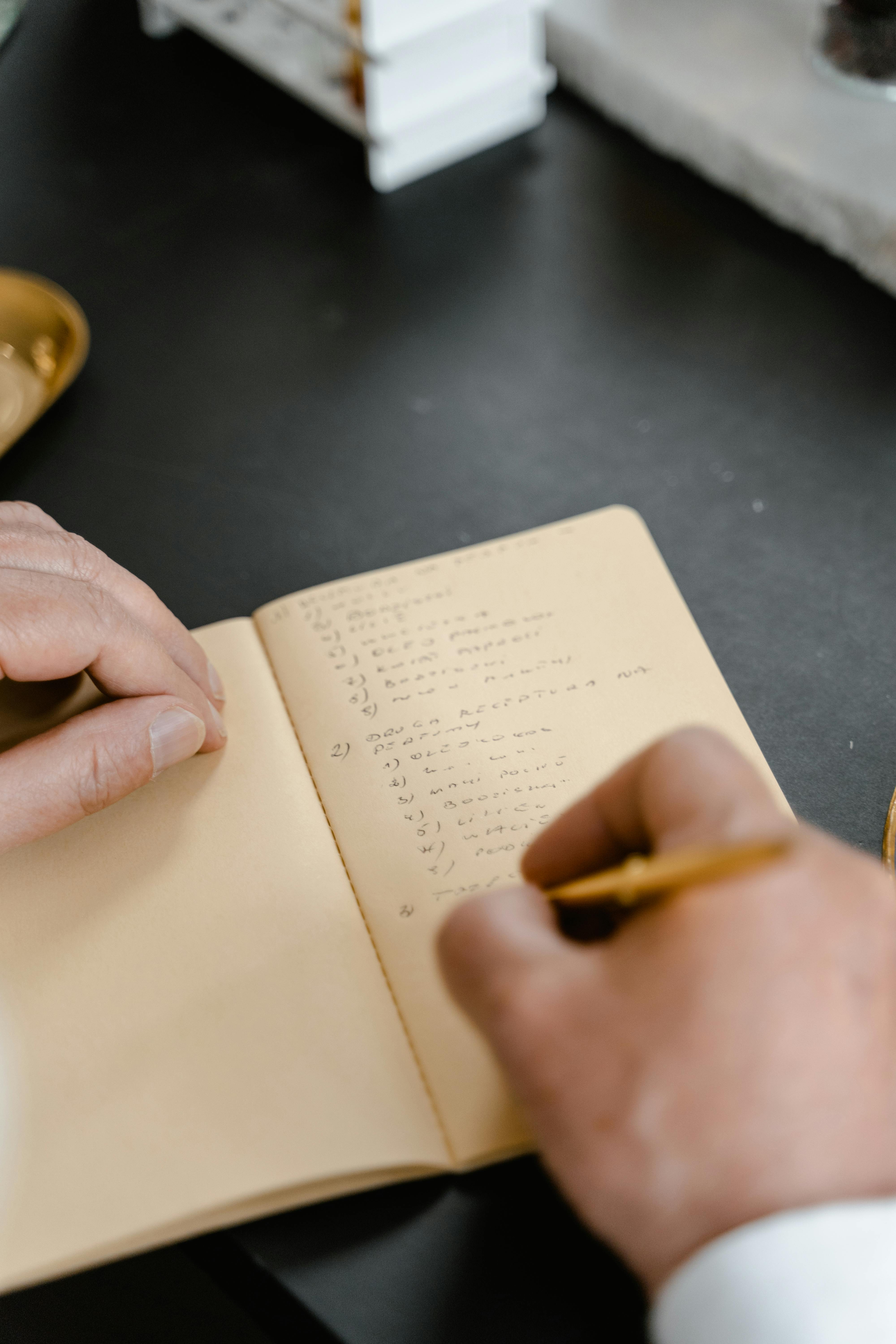 Checklist of year end tasks in notebook