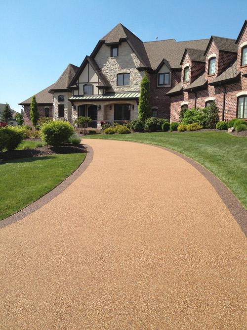 Stone Epoxy Overlay System In A Driveway