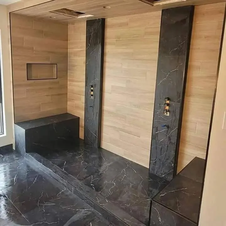 Small bathroom remodel with built-in shelves and space-saving vanity.