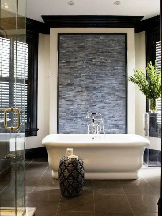 Double sink vanity with LED backlit mirrors and quartz countertop.