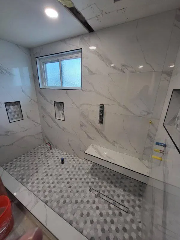 Affordable bathroom upgrade with neutral tones and modern finishes.