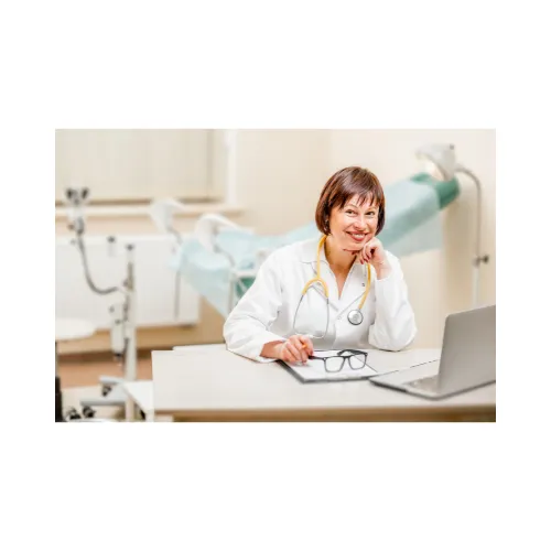 female doctor by her computer