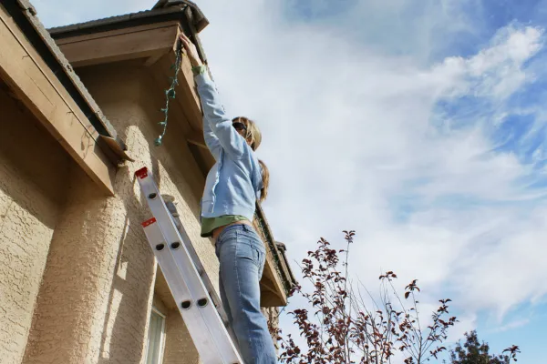 Light Up Your Holidays Safely: Tips for Hanging Christmas Lights on Your Roof