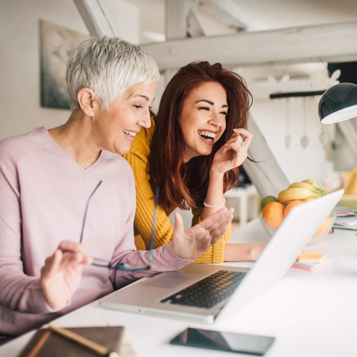 two women working together on a financial plan