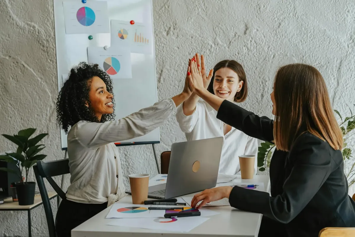 Manager delegating tasks to a team in a virtual meeting
