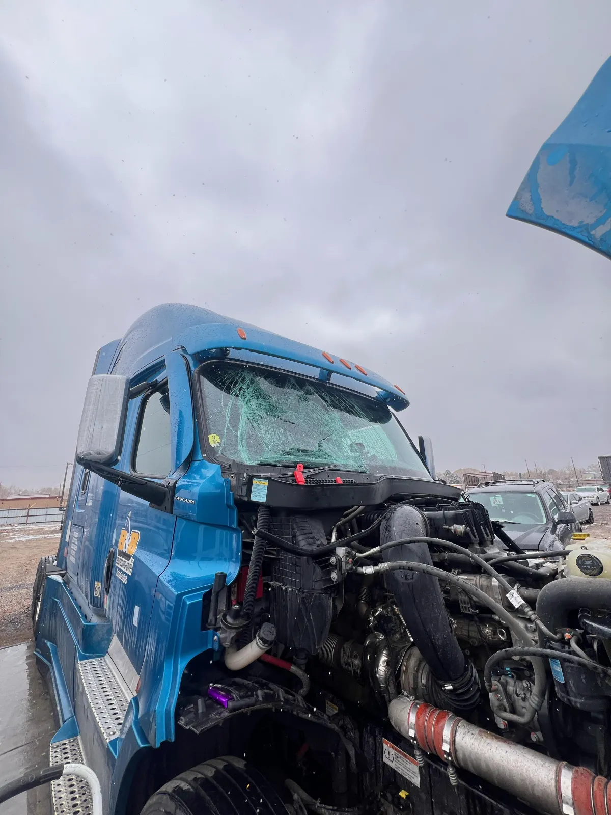 "A Toyota 4Runner with a damaged windshield, showing visible chips and cracks. The image highlights the need for professional windshield repair or replacement to restore safety and visibility."
