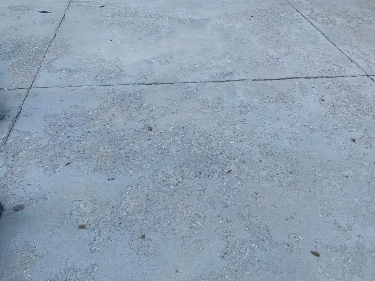 Salt damaged concrete driveway