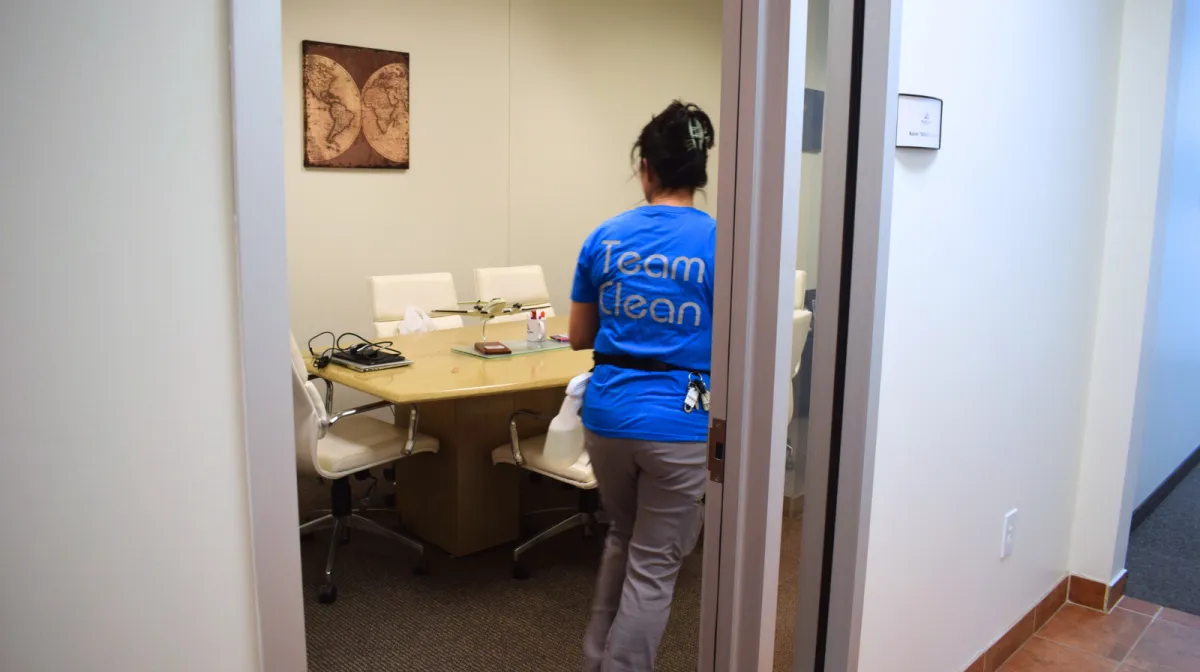 Team Member Cleaning King Air Academy Office