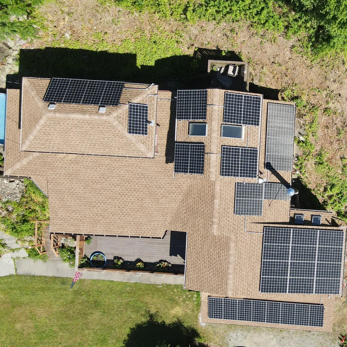air shot of solar panels on rooftop