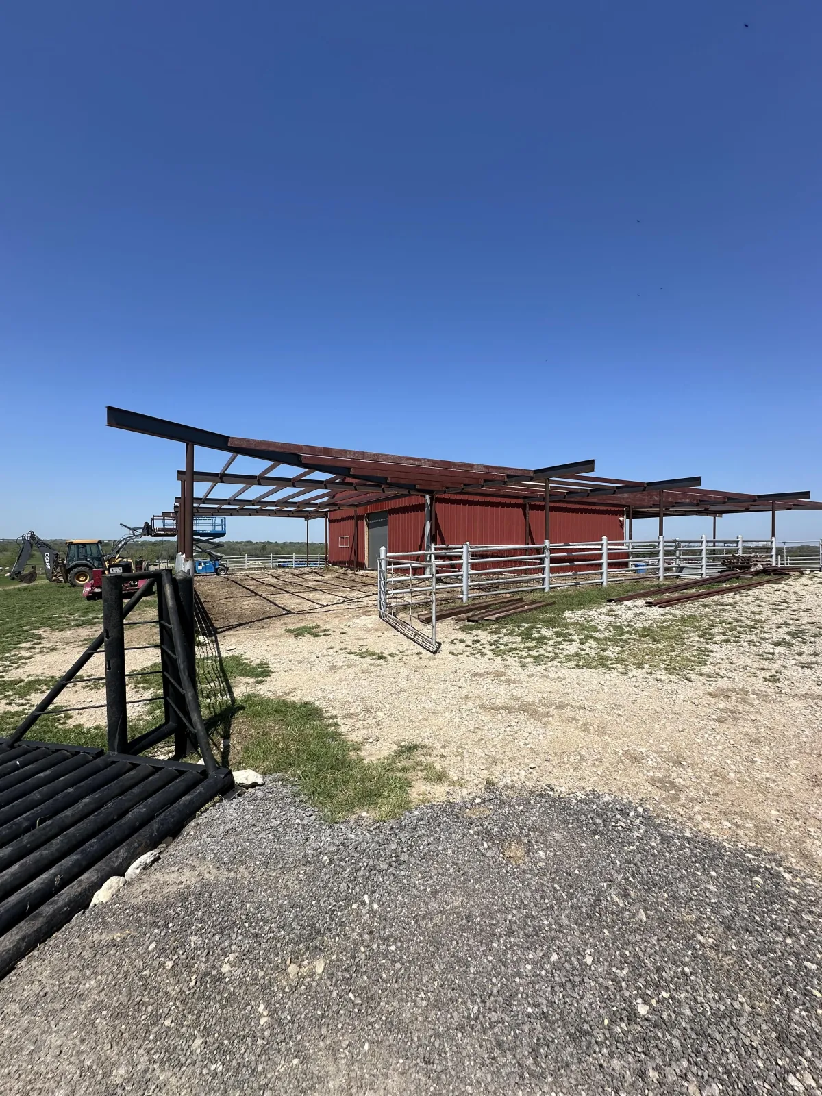 Ranch barn canopy — steel beams and posts during assembly.