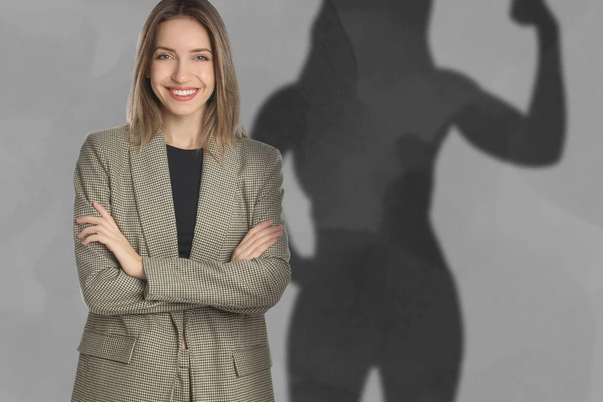 A person standing confidently with a bright light symbolizing integrity and inner strength