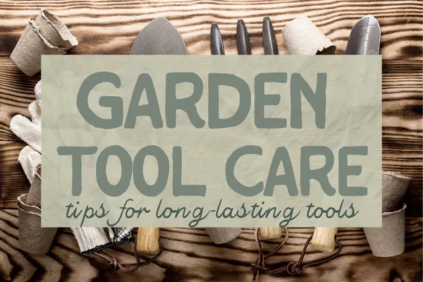 Close-up of Barebones garden tools on a rustic workbench, showing pruners, trowels, and a sharpening stone ready for tool maintenance