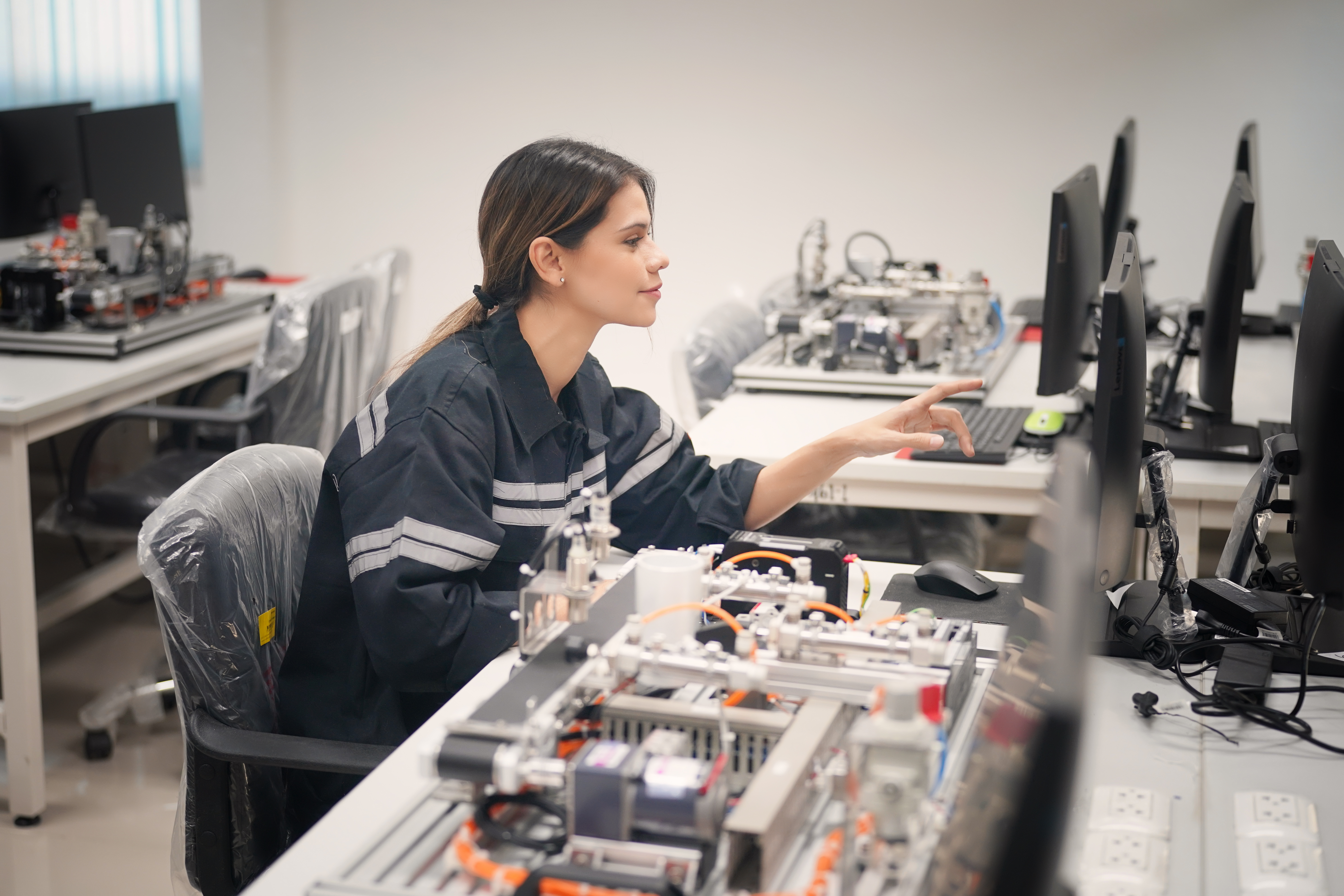 Young Engineer in Hardware Lab working on FPGA based robotic arm