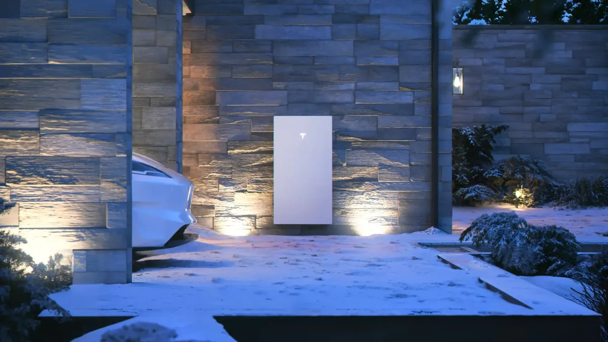 Professional installation of Tesla Powerwall 3 on a Salem UT home wall, with solar panels in background, emphasizing seamless setup by Ask Solar Mike