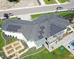 Dynamic Payson home as solar powerhouse with Tesla Powerwall batteries and panels, powering 30% instant rebates for Utah energy independence in 2026 market changes.