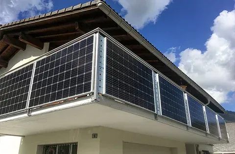 Lehi Utah home with solar panels and Tesla Powerwall in tech valley setting, showcasing 30% upfront rebates for rate protection.