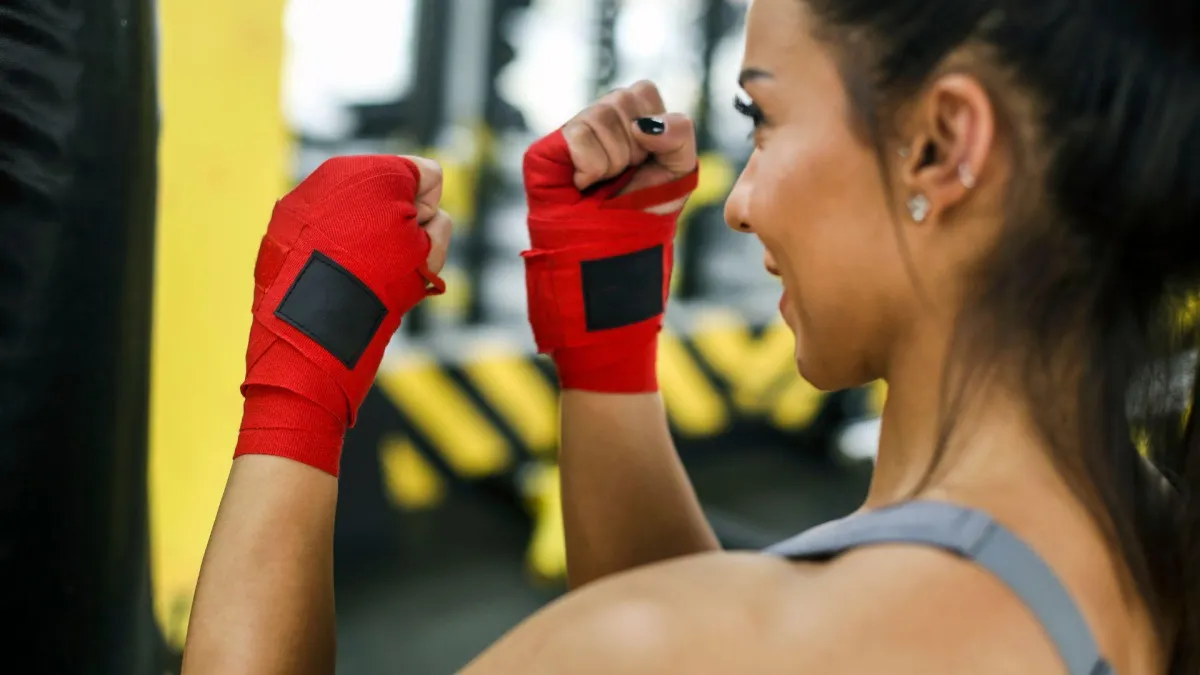 woman learns what kickboxing is