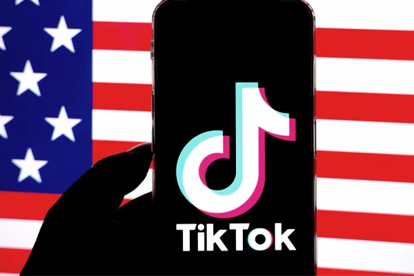 tiktok on phone infront of american flag