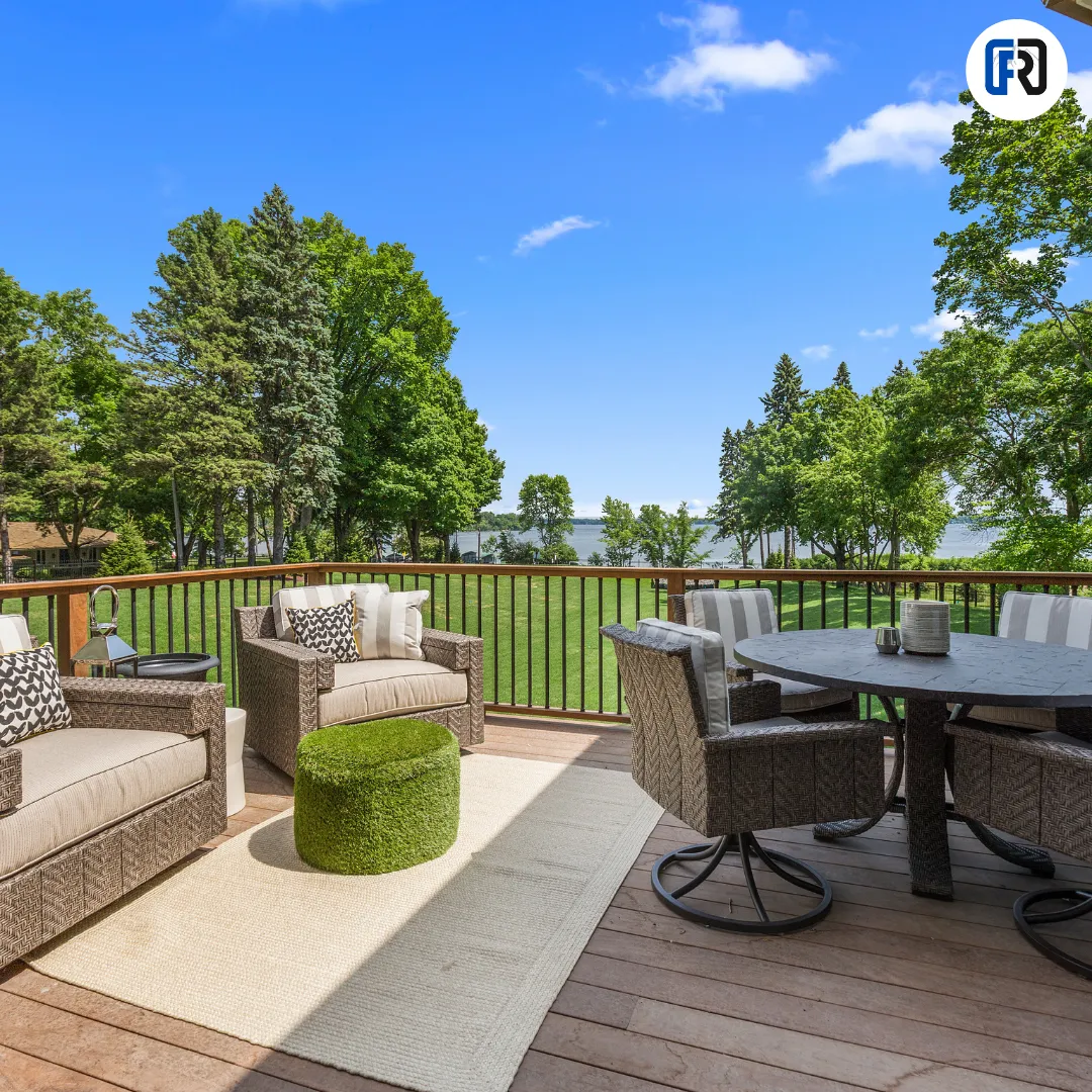 "Cozy Colorado patio with fire pit, string lights, and winter seating surrounded by snow"