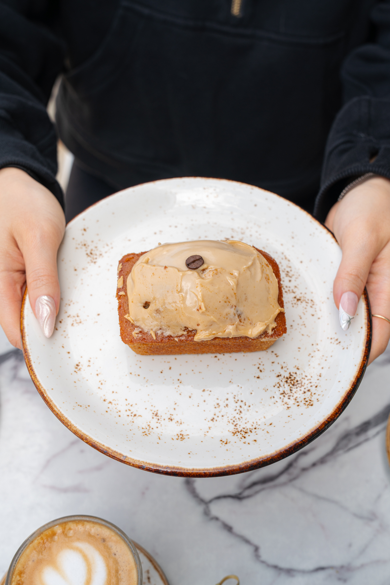 House-baked pastry slices displayed at Farmers Branch bakery location
