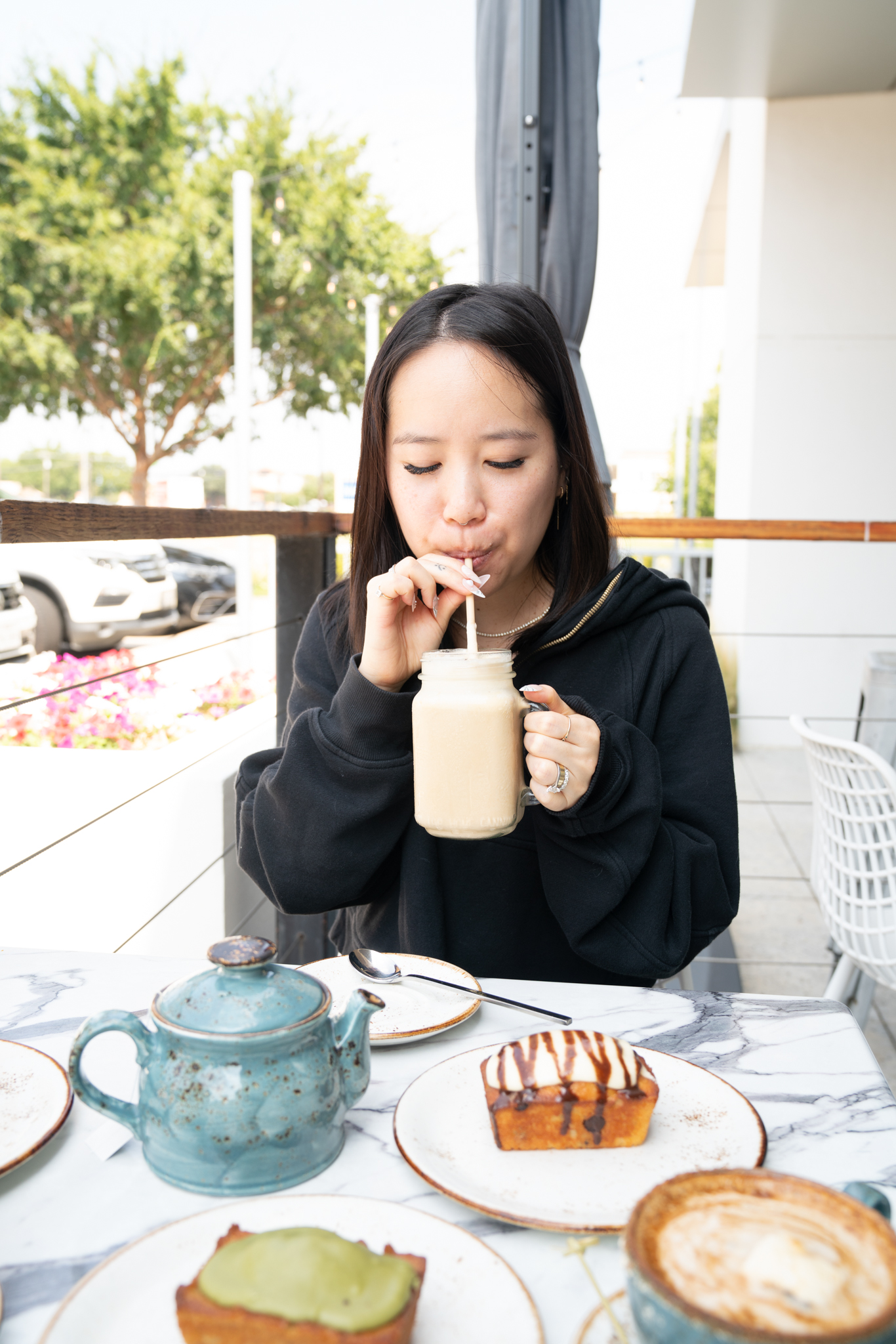 Outdoor seating area at The Aussie Grind Provisions in Farmers Branch, TX