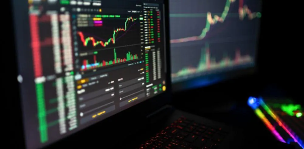 Cryptocurrency being bought and sold on a centralised exchange crypto site on an open laptop screen
